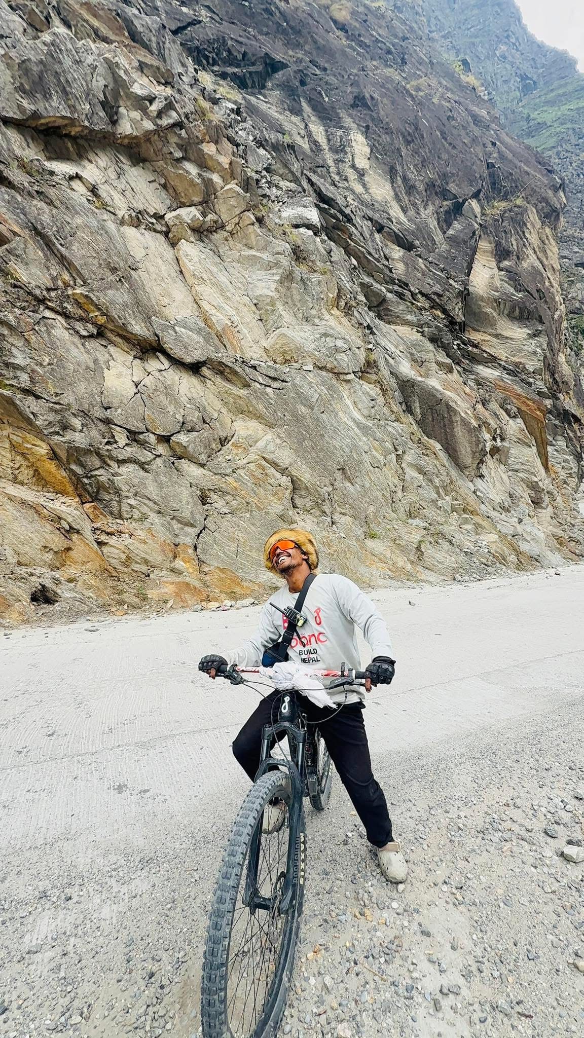 Riding on a rocky mountain road, laughing